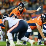DENVER, CO - AUGUST 18:  Quarterback Paxton Lynch #12 of the Denver Broncos runs the offense in the fourth quarter during an NFL preseason game against the Chicago Bears at Broncos Stadium at Mile High on August 18, 2018 in Denver, Colorado. (Photo by Dustin Bradford/Getty Images)