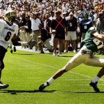 CAUGHT OUT OF BOUNDS???--CU vs. CSU FOOTBALL--8-31-02-- This catch by CSU WR Joey Cuppari was ruled out of bounds during the second quarter at the Rocky Mountain Showdown at Invesco at Mile High Stadium Saturday. CU defensive back Phil Jackson defends at left. CSU beat CU 19-14. DENVER POST STAFF PHOTO BY GLENN ASAKAWA  (Photo By Glenn Asakawa/The Denver Post via Getty Images)