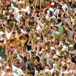 4 Sep 1999: Fans of the Colorado Buffalos cheer in the stadium during the game against the Colorado State Rams at the Mile High Stadium in Denver, Colorado. The Rams defeated the Buffalos 41-14.