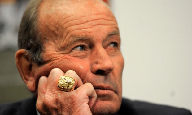Pat Bowlen watches John Elway speak during the Denver Broncos press conference announcing the signi...