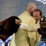 CANTON, OH - AUGUST 2:  Gary Zimmerman(L) formerly of the Minnesota Vikings and Denver Broncos hugs Broncos owner Pat Bowlen during the Class of 2008 Pro Football Hall of Fame Enshrinement Ceremony at Fawcett Stadium on August 2, 2008 in Canton, Ohio.   (Photo by Al Messerschmidt/Getty Images)