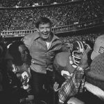 JAN 2 1978, JUL 4 1983 Bronco Coach Robert 'Red' Miller gets the traditional ride ***** The field on shoulders of Players, Billy Thompson, left, Glenn Hyde do the honors. Credit: Denver Post (Denver Post via Getty Images)