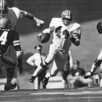 OCT 8 1972, OCT 9 1972 Denver Broncos (Action) Mike current leads way on 24-yard run by Floyd Little Current takes aim at Cincinnati's Neil Craig (34) at Little runs past Mike Reid. play set up 38-yard field goal by Jim Turner. Credit: Denver Post  (Denver Post via Getty Images)