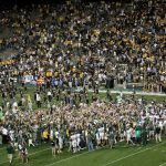 BOULDER, CO - SEPTEMBER 06:  Colorado State fans rush the field to celebrate with the Colorado State Rams after they defeated the Colorado Buffaloes 23-17 at Folsom Field on September 6, 2009 in Boulder, Colorado.  (Photo by Doug Pensinger/Getty Images)