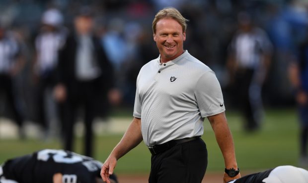 Head coach Jon Gruden of the Oakland Raiders looks on during warm ups prior to their NFL game again...