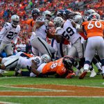 DENVER, CO - SEPTEMBER 16:  Running back Royce Freeman #28 of the Denver Broncos dives into the end zone with a third quarter touchdown against the Oakland Raiders at Broncos Stadium at Mile High on September 16, 2018 in Denver, Colorado. (Photo by Dustin Bradford/Getty Images)