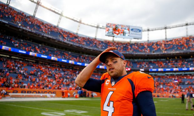 Quarterback Case Keenum #4 of the Denver Broncos walks off the field after a 20-19 win over the Oak...