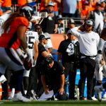 DENVER, CO - SEPTEMBER 16:  Head coach Jon Gruden of the Oakland Raiders drops to his knees as he reacts after the Oakland Raiders failed to convert a fourth down in the fourth quarter of a game against the Denver Broncos at Broncos Stadium at Mile High on September 16, 2018 in Denver, Colorado. (Photo by Justin Edmonds/Getty Images)