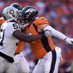DENVER, CO - SEPTEMBER 16, 2018:  Defensive end Bruce Irvin (51) of the Oakland Raiders and offensive tackle Garett Bolles (72) of the Denver Broncos mix words after a play during the fourth quarter on Sunday, September 16 at Broncos Stadium at Mile High. The Denver Broncos hosted the Oakland Raiders for the second game of the season. (Photo by Eric Lutzens/The Denver Post via Getty Images)
