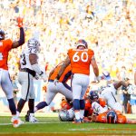 DENVER, CO - SEPTEMBER 16:  Quarterback Case Keenum #4 of the Denver Broncos dives into the end zone with a fourth quarter quarterback keeper touchdown against the Oakland Raiders at Broncos Stadium at Mile High on September 16, 2018 in Denver, Colorado. (Photo by Justin Edmonds/Getty Images)