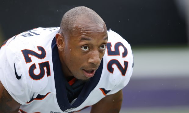 Chris Harris Jr. #25 of the Denver Broncos reacts as his blocked field goal return for touchdown is...