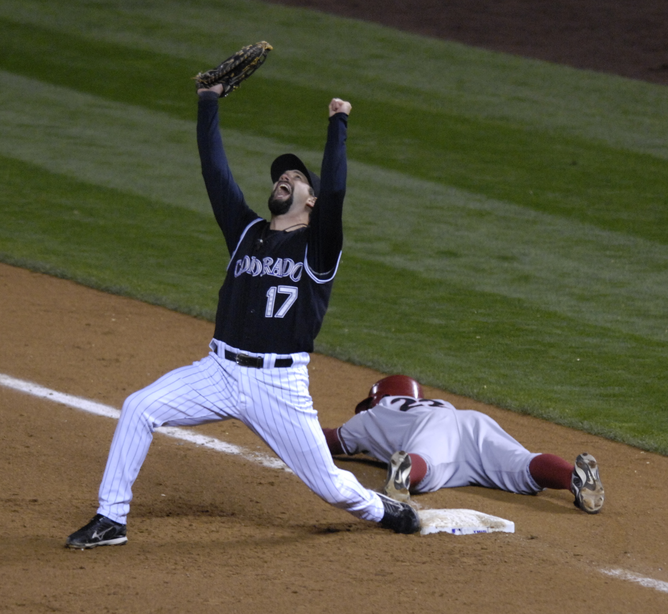 FILE - Colorado Rockies first baseman Todd Helton (17) celebrates after he  made the last out to win Game 4 of the National League Championship  baseball series against the Arizona Diamondbacks, 6-4