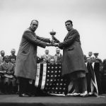 In Leeds, British golfer George Duncan (1883 - 1964) captain of the British Ryder Cup team is presented with the cup by British businessman Samuel Ryder (1859-1936), founder of the Ryder Golf Cup.  (Photo by Central Press/Getty Images)