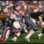 9 Sep 1990:  Defensive lineman Greg Kragen of the Denver Broncos tackles a Los Angeles Raiders player during a game at the Coliseumin Los Angeles, California.  The Raiders won the game, 14-9. Mandatory Credit: Rick Stewart  /Allsport