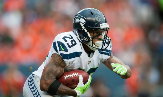 Free safety Earl Thomas #29 of the Seattle Seahawks returns a punt against the Denver Broncos durin...