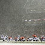 DENVER - NOVEMBER 28: The Denver Broncos take on the Oakland Raiders in a snowstorm on November 28, 2004 at Invesco Field at Mile High Stadium in Denver, Colorado.  The Raiders won 25-24.  (Photo by Brian Bahr/Getty Images)