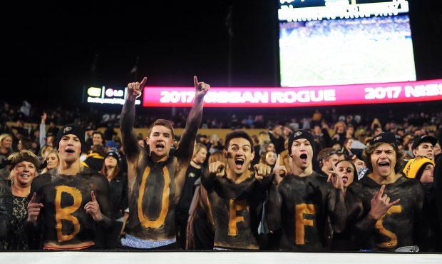 Buffs fans cheer as they wear body paint during a game between the Colorado Buffaloes and the UCLA ...