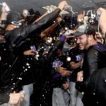 DENVER, CO - SEPTEMBER 30:  Members of the Colorado Rockies celebrate in the lockerroom at Coors Field on September 30, 2017 in Denver, Colorado. Although losing 5-3 to the Los Angeles Dodgers, the Rockies celebrated clinching a wild card spot in the post season. (Photo by Matthew Stockman/Getty Images)