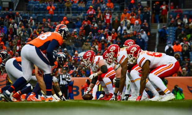 The Kansas City Chiefs line up on offense behind offensive tackle Jordan Devey #65 in the third qua...
