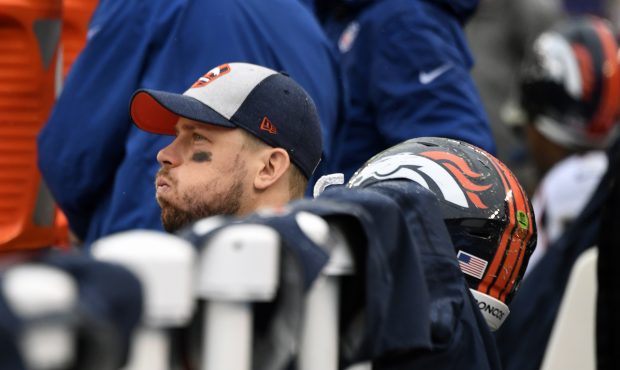 Denver Broncos quarterback Case Keenum #4 on the bench as time runs down in the 4th quarter against...