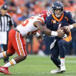 Quarterback Case Keenum #4 of the Denver Broncos is sacked by linebacker Dee Ford #55 of the Kansas City Chiefs in the first quarter of a game at Broncos Stadium at Mile High on October 1, 2018 in Denver, Colorado. (Photo by Matthew Stockman/Getty Images)