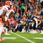 The Denver Broncos offense lines up behind center Matt Paradis #61 against the Kansas City Chiefs at Broncos Stadium at Mile High on October 1, 2018 in Denver, Colorado. (Photo by Dustin Bradford/Getty Images)