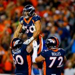 Running back Phillip Lindsay #30 of the Denver Broncos celebrates with offensive guard Connor McGovern #60 and offensive tackle Garett Bolles #72  after scoring a third-quarter touchdown against the Kansas City Chiefs at Broncos Stadium at Mile High on October 1, 2018 in Denver, Colorado. (Photo by Justin Edmonds/Getty Images)