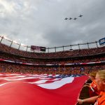 Four A-10 Warthog jets perform a flyover as the United States Flag is stretched over the field before a game between the Denver Broncos and the Kansas City Chiefs at Broncos Stadium at Mile High on October 1, 2018 in Denver, Colorado. (Photo by Dustin Bradford/Getty Images)
