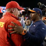 Head coach Vance Joseph of the Denver Broncos shakes hands with head coach Andy Reid of the Kansas City Chiefs after a 27-23 Chiefs win over the Broncos at Broncos Stadium at Mile High on October 1, 2018 in Denver, Colorado. (Photo by Matthew Stockman/Getty Images)