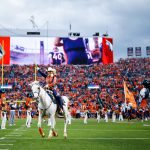 Denver Broncos mascot Thunder is ridden onto the field by Ann Judge before a game between the Denver Broncos and the Kansas City Chiefs at Broncos Stadium at Mile High on October 1, 2018 in Denver, Colorado. (Photo by Justin Edmonds/Getty Images)