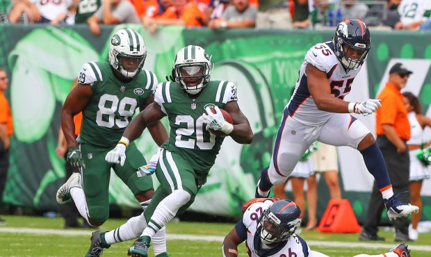 New York Jets running back Isaiah Crowell (20) runs for a touchdown during the second quarter of th...