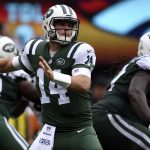 Quarterback Sam Darnold #14 of the New York Jets looks for an open receiver during the second quarter on Sunday, October 7 at MetLife Stadium. The NY Jets hosted the Denver Broncos. (Photo by Eric Lutzens/The Denver Post via Getty Images)