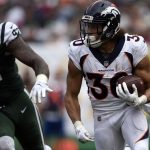 Running back Phillip Lindsay #30 of the Denver Broncos runs the ball gaining yards during the second quarter on Sunday, October 7 at MetLife Stadium. The NY Jets hosted the Denver Broncos. (Photo by Eric Lutzens/The Denver Post via Getty Images)