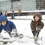 Carter Sheldon, 8, left, and his brother Conor Sheldon, 3, play in the snow out in front of the Broncos Stadium at Mile High before the Denver Broncos played the Los Angeles Rams October 14, 2018. (Photo by Andy Cross/The Denver Post via Getty Images)