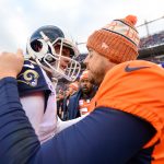 Quarterback Jared Goff #16 of the Los Angeles Rams and quarterback Case Keenum #4 of the Denver Broncos shake hands on the field after the Rams' 23-20 win at Broncos Stadium at Mile High on October 14, 2018 in Denver, Colorado. (Photo by Dustin Bradford/Getty Images)