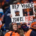 A Denver Broncos fan holds a sign asking for the firing of head coach Vance Joseph of the Denver Broncos during a game between the Denver Broncos and the Los Angeles Rams at Broncos Stadium at Mile High on October 14, 2018 in Denver, Colorado. (Photo by Dustin Bradford/Getty Images)