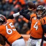 Quarterback Case Keenum #4 of the Denver Broncos passes under pressure in the third quarter of a game against the Los Angeles Rams at Broncos Stadium at Mile High on October 14, 2018 in Denver, Colorado. (Photo by Dustin Bradford/Getty Images)