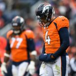 Quarterback Case Keenum #4 of the Denver Broncos hangs his head as he walks on the field in the third quarter of a game against the Los Angeles Rams at Broncos Stadium at Mile High on October 14, 2018 in Denver, Colorado. (Photo by Dustin Bradford/Getty Images)
