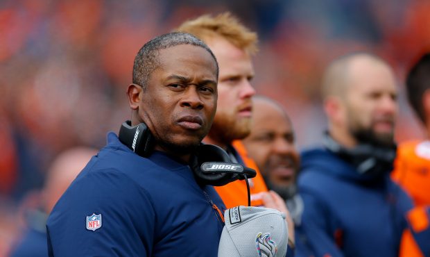 Head coach Vance Joseph of the Denver Broncos stands on the field during the National Anthem before...