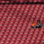 Fans watch warm ups before the game between the Arizona Cardinals and the Denver Broncos at State Farm Stadium on October 18, 2018 in Glendale, Arizona. (Photo by Norm Hall/Getty Images)