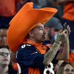A Denver Broncos fan takes a photo during the second half against the Arizona Cardinals at State Farm Stadium on October 18, 2018 in Glendale, Arizona. (Photo by Norm Hall/Getty Images)