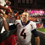 Quarterback Case Keenum #4 of the Denver Broncos celebrates with fans after the Broncos beat the Arizona Cardinals 45-10 at State Farm Stadium on October 18, 2018 in Glendale, Arizona. (Photo by Christian Petersen/Getty Images)