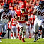 KANSAS CITY, MO - OCTOBER 28: Tyreek Hill #10 of the Kansas City Chiefs breaks away in to the open field from Todd Davis #51 and Shelby Harris #96 of the Denver Broncos during the second quarter of the game at Arrowhead Stadium on October 28, 2018 in Kansas City, Missouri. (Photo by David Eulitt/Getty Images)