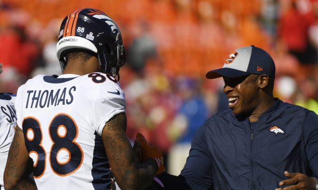 Denver Broncos head coach Vance Joseph, right,, greets Denver Broncos wide receiver Demaryius Thoma...