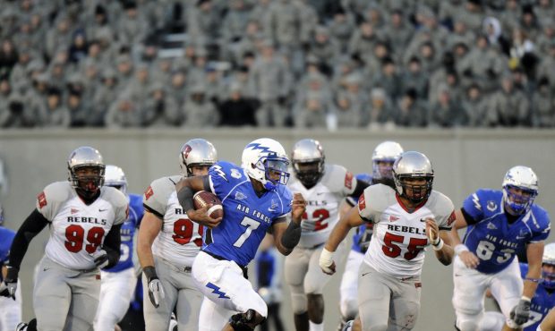 Air Force QB Ti Jefferson Jr. (7) scrambles against UNLV in the 1st half of the game at Falcon Stad...