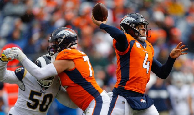 DENVER, CO - OCTOBER 14:  Quarterback Case Keenum #4 of the Denver Broncos throws a pass during the...