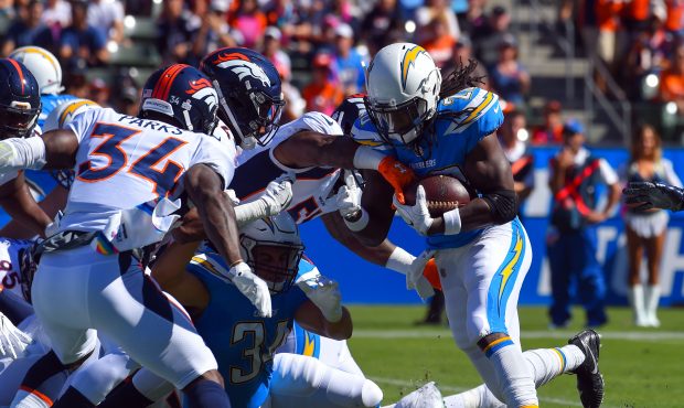 Chargers Melvin Gordon is stopped by the Broncos on a goal line stand in Carson, CA on Sunday, Octo...