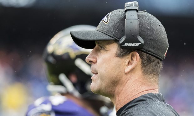 Head coach John Harbaugh of the Baltimore Ravens looks on against the Denver Broncos during the fir...