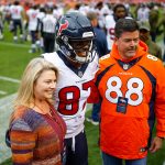 DENVER, CO - NOVEMBER 4:  Wide receiver Demaryius Thomas #87 of the Houston Texans takes a photo with fans, including one wearing his former Denver Broncos jersey, during warm ups before a game against the Broncos at Broncos Stadium at Mile High on November 4, 2018 in Denver, Colorado. (Photo by Justin Edmonds/Getty Images)