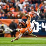 DENVER, CO - NOVEMBER 4:  Running back Phillip Lindsay #30 of the Denver Broncos at Broncos Stadium is upended after getting hit in the third quarter of a game against the Houston Texans at Mile High on November 4, 2018 in Denver, Colorado. (Photo by Dustin Bradford/Getty Images)
